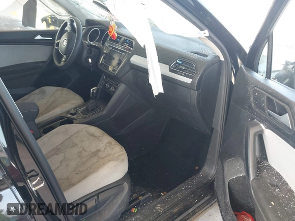 2021 Volkswagen Tiguan S with VIN 3VV0B7AX1MM098300, listed as a IAAI auction lot 42574636 with 53,559 mi miles and . Bid and sale history available at DreamBid. Image 5.