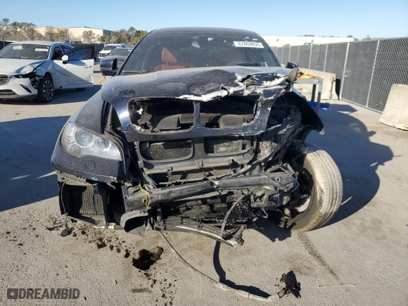 2012 BMW X6 M with VIN 5YMGZ0C59CLK14863, listed as a Copart auction lot 87869855 with 0 mi miles and Salvage Title. Bid and sale history available at carsss.com. Image 5.