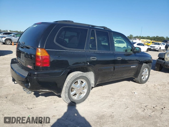 2005 GMC Envoy SLT with VIN 1GKDS13S352297652, listed as a Copart auction lot 41614205 with 71,937 mi miles and Salvage Title. Bid and sale history available at carsss.com. Image 3.