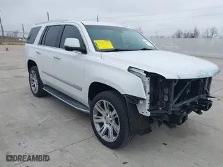 2018 Cadillac Escalade Luxury with VIN 1GYS3BKJ2JR223679, listed as a IAAI auction lot 41429770 with 76,440 mi miles. Bid and sale history available at carsss.com. Image 1.