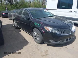 2013 Lincoln MKS with VIN 1LNHL9DK3DG613720, listed as a IAAI auction lot 42055189 with 115,502 mi miles and . Bid and sale history available at DreamBid. Image 1.
