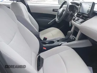 2022 Toyota Corolla Cross L with VIN 7MUAAAAG5NV013226, listed as a IAAI auction lot 42491707 with 34,514 mi miles and . Bid and sale history available at DreamBid. Image 5.