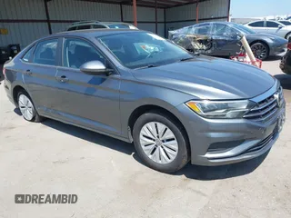 2019 Volkswagen Jetta S z VIN 3VWC57BUXKM074708, wystawiony jako IAAI lot #42151448 z przebiegiem 189 430 mil mil oraz . Historia ofert i sprzedaży dostępna na DreamBid. Obrazek 1.