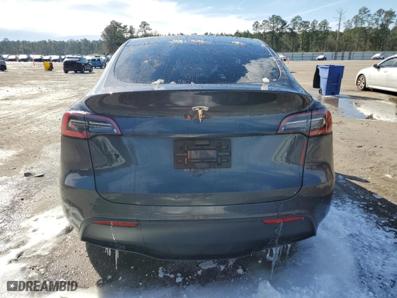 2021 Tesla Model Y Standard Range with VIN 5YJYGDED5MF112740, listed as a Copart auction lot 89188825 with 99,991 mi miles and Salvage Title. Bid and sale history available at carsss.com. Image 6.