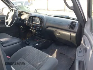 2003 Toyota Tundra SR5 with VIN 5TBBT44153S393708, listed as a IAAI auction lot 41591859 with 107,800 mi miles and . Bid and sale history available at DreamBid. Image 5.