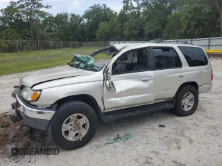 2000 Toyota 4Runner SR5 z VIN JT3GN86R5Y0153123, wystawiony jako Copart lot #59538205 z przebiegiem 214 846 mil mil oraz Czysty tytuł • Clean title. Historia ofert i sprzedaży dostępna na DreamBid. Obrazek 1.