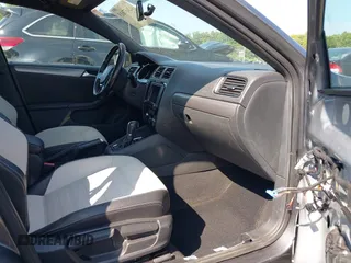 2017 Volkswagen Jetta Sport z VIN 3VWD17AJ6HM284934, wystawiony jako IAAI lot #42657613 z przebiegiem 85 929 mil mil oraz . Historia ofert i sprzedaży dostępna na DreamBid. Obrazek 5.