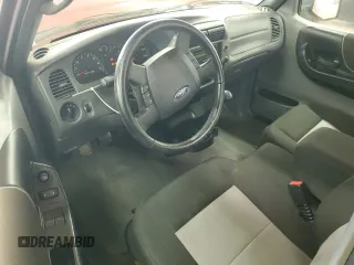 2009 Ford Ranger XL with VIN 1FTYR10D39PA15761, listed as a Copart auction lot 61823265 with 148,225 mi miles and Salvage title. Bid and sale history available at DreamBid. Image 8.