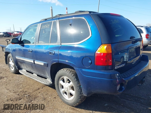 2003 GMC Envoy SLT with VIN 1GKDT13S732268164, listed as a IAAI auction lot 41863800 with 100,702 mi miles. Bid and sale history available at carsss.com. Image 3.