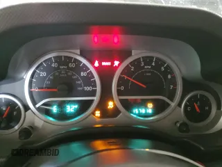2009 Jeep Wrangler Unlimited Rubicon with VIN 1J8GA69179L756441, listed as a Copart auction lot 52111435 with 157,818 mi miles and Salvage title. Bid and sale history available at DreamBid. Image 9.