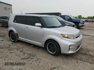 2012 Scion xB z VIN JTLZE4FE1C1144663, wystawiony jako Copart lot #59040605 z przebiegiem 199 468 mil mil oraz Tytuł czysty. Historia ofert i sprzedaży dostępna na DreamBid. Obrazek 4.