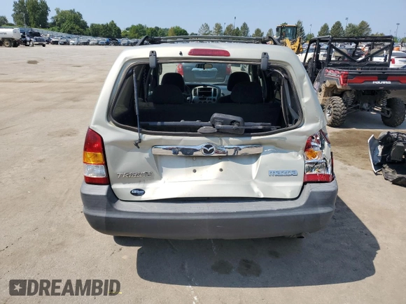 2004 Mazda Tribute DX with VIN 4F2YZ02B74KM13874, listed as a Copart auction lot 65422864 with 288,215 mi miles and Salvage Title. Bid and sale history available at carsss.com. Image 6.