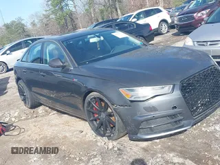 2013 Audi A6 Premium Plus z VIN WAUGGAFC0DN010342, wystawiony jako IAAI lot #41584676 z przebiegiem Nie podano mil oraz . Historia ofert i sprzedaży dostępna na DreamBid. Obrazek 1.