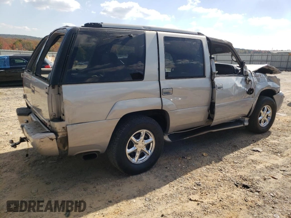 2000 GMC Denali z VIN 1GKEK13R2YR138523, wystawiony jako Copart lot #77609804 z przebiegiem 203 514 mil mil oraz Szkody całkowita. Historia ofert i sprzedaży dostępna na DreamBid. Obrazek 3.