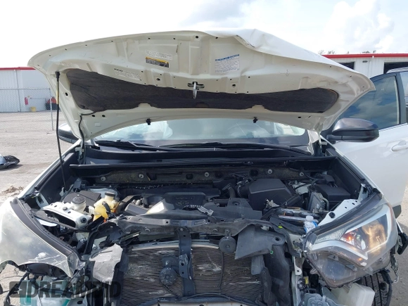 2017 Toyota RAV4 LE with VIN JTMZFREV3HJ143416, listed as a IAAI auction lot 41861981 with 115,241 mi miles and . Bid and sale history available at DreamBid. Image 10.