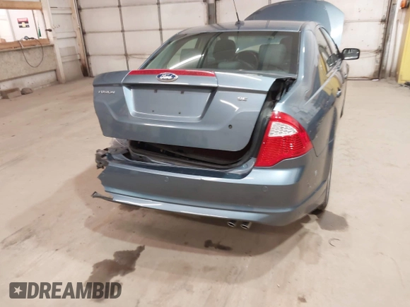 2012 Ford Fusion SE z VIN 3FAHP0HA9CR180004, wystawiony jako IAAI lot #42037384 z przebiegiem 111 262 mil mil oraz . Historia ofert i sprzedaży dostępna na DreamBid. Obrazek 6.