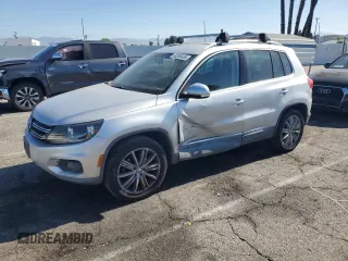 2012 Volkswagen Tiguan SE with VIN WVGAV7AXXCW517605, listed as a Copart auction lot 63290435 with 129,612 mi miles and Salvage title. Bid and sale history available at DreamBid. Image 1.