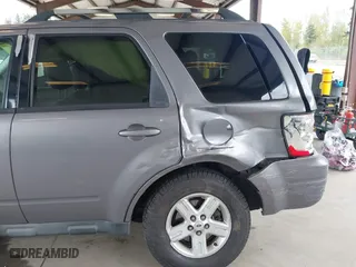 2008 Ford Escape Hybrid with VIN 1FMCU59H08KA06691, listed as a IAAI auction lot 42021967 with 221,067 mi miles. Bid and sale history available at carsss.com. Image 6.