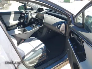 2024 Subaru Solterra Premium z VIN JTMABABA6RA063380, wystawiony jako IAAI lot #41825083 z przebiegiem 1 853 mil mil oraz . Historia ofert i sprzedaży dostępna na DreamBid. Obrazek 5.