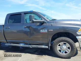 2015 Ram 2500 Tradesman z VIN 3C6TR5CT5FG528294, wystawiony jako IAAI lot #42374966 z przebiegiem Nie podano mil oraz . Historia ofert i sprzedaży dostępna na DreamBid. Obrazek 6.