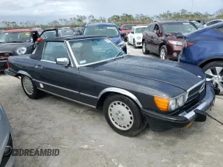 1987 Mercedes-Benz 560 with VIN WDBBA48D9HA060044, listed as a Copart auction lot 76965694 with 76,957 mi miles and Non Repairable. Bid and sale history available at carsss.com. Image 4.