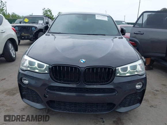 2015 BMW X4 xDrive28i with VIN 5UXXW3C54F0M88740, listed as a IAAI auction lot 42275157 with 159,281 mi miles and . Bid and sale history available at DreamBid. Image 6.