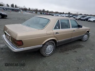 1986 Mercedes-Benz 420 420SEL with VIN WDBCA35D8GA273147, listed as a Copart auction lot 86555544 with 111,782 mi miles and Salvage Title. Bid and sale history available at carsss.com. Image 3.