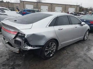 2014 Lincoln MKZ with VIN 3LN6L2G9XER814581, listed as a IAAI auction lot 41664814 with 153,449 mi miles. Bid and sale history available at carsss.com. Image 4.