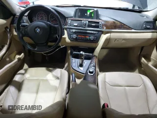2015 BMW 3 Series 320i xDrive with VIN WBA3C3C52FP664472, listed as a Copart auction lot 55647585 with 129,934 mi miles and Salvage title. Bid and sale history available at DreamBid. Image 8.