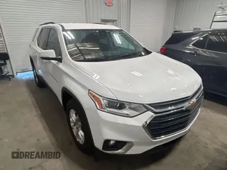 2021 Chevrolet Traverse LT Cloth z VIN 1GNEVGKWXMJ158581, wystawiony jako IAAI lot #42233454 z przebiegiem 131 571 mil mil oraz . Historia ofert i sprzedaży dostępna na DreamBid. Obrazek 1.