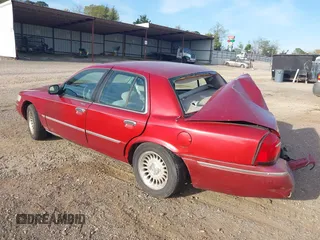 2000 Mercury Grand Marquis LS z VIN 2MEFM75W1YX736283, wystawiony jako IAAI lot #41879063 z przebiegiem 114 535 mil mil oraz . Historia ofert i sprzedaży dostępna na DreamBid. Obrazek 3.