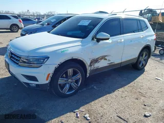 2019 Volkswagen Tiguan SEL Premium with VIN 3VV4B7AX0KM007788, listed as a IAAI auction lot 41227707 with 67,859 mi miles. Bid and sale history available at carsss.com. Image 2.