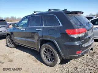 2014 Jeep Grand Cherokee Overland with VIN 1C4RJFCT8EC409673, listed as a Copart auction lot 45271555 with 136,810 mi miles and Salvage Title. Bid and sale history available at carsss.com. Image 2.