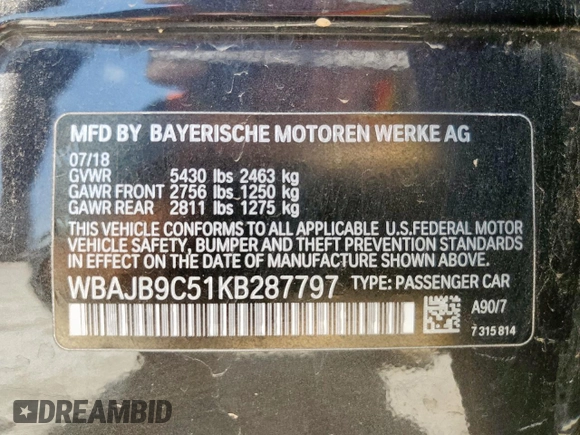 2019 BMW 5 Series M550i xDrive with VIN WBAJB9C51KB287797, listed as a Copart auction lot 65382465 with 61,459 mi miles and Salvage title. Bid and sale history available at DreamBid. Image 12.
