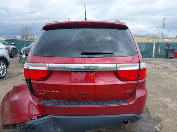 2013 Dodge Durango Crew with VIN 1C4RDJDG8DC540399, listed as a IAAI auction lot 42041455 with 126,435 mi miles. Bid and sale history available at carsss.com. Image 16.