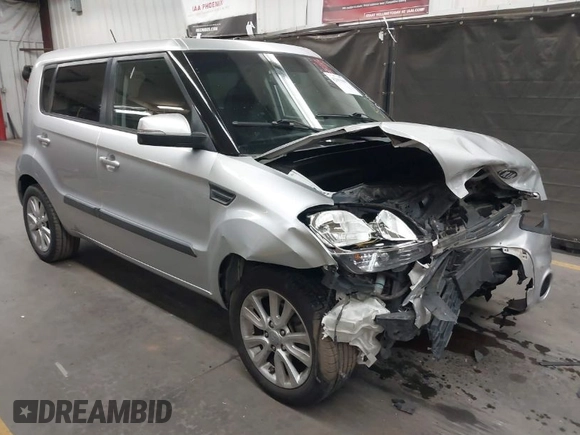 2012 Kia Soul + with VIN KNDJT2A66C7403146, listed as a IAAI auction lot 42003669 with 142,522 mi miles. Bid and sale history available at carsss.com. Image 1.