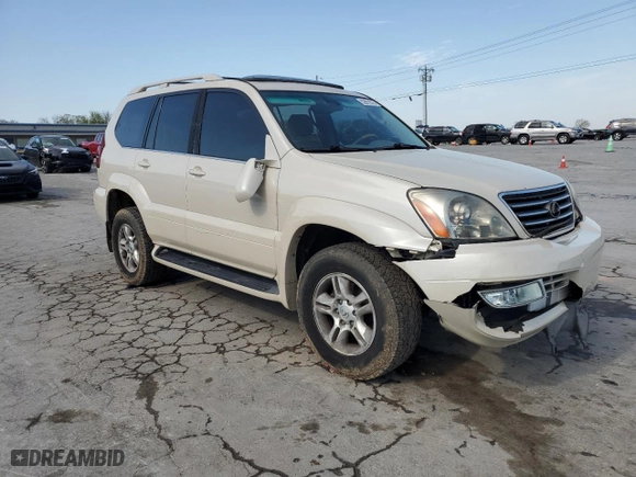 2003 Lexus GX 470 with VIN JTJBT20XX30010271, listed as a Copart auction lot 52812575 with 291,394 mi miles and Salvage Title. Bid and sale history available at carsss.com. Image 4.