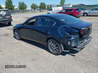 2021 Mazda 3 S with VIN JM1BPAALXM1341814, listed as a IAAI auction lot 42797513 with 32,167 mi miles and . Bid and sale history available at DreamBid. Image 3.