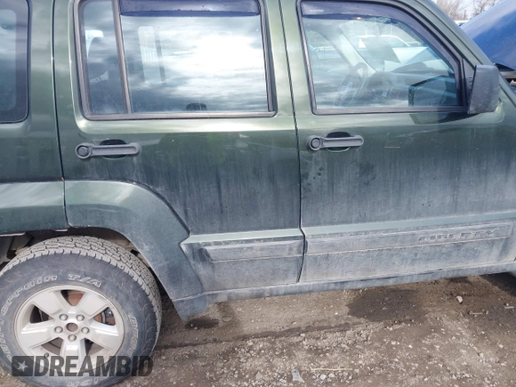 2012 Jeep Liberty Sport with VIN 1C4PJMAK8CW104272, listed as a IAAI auction lot 41841519 with 163,979 mi miles. Bid and sale history available at carsss.com. Image 16.