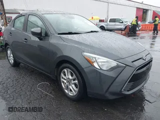 2016 Scion iA with VIN 3MYDLBZVXGY103088, listed as a IAAI auction lot 41113758 with 89,957 mi miles. Bid and sale history available at carsss.com. Image 1.