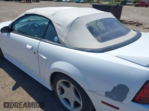 1999 Ford Mustang GT z VIN 1FAFP45X1XF215757, wystawiony jako IAAI lot #42311086 z przebiegiem 138 832 mil mil oraz . Historia ofert i sprzedaży dostępna na DreamBid. Obrazek 16.