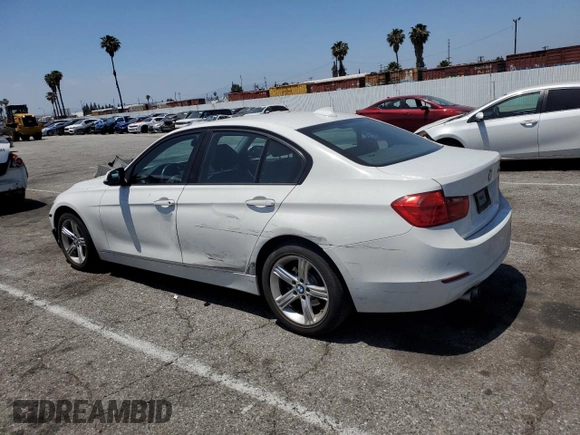 2015 BMW 3 Series 328i with VIN WBA3C1C56FK122177, listed as a Copart auction lot 57333625 with 102,399 mi miles and Salvage title. Bid and sale history available at DreamBid. Image 2.