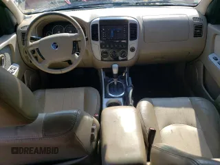 2006 Mercury Mariner Hybrid z VIN 4M2CU98H16KJ16041, wystawiony jako Copart lot #62182264 z przebiegiem 242 209 mil mil oraz Szkoda całkowita • Salvage title. Historia ofert i sprzedaży dostępna na DreamBid. Obrazek 8.