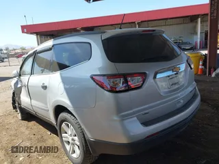 2013 Chevrolet Traverse LT with VIN 1GNKVGKD7DJ198330, listed as a IAAI auction lot 41669654 with 185,602 mi miles and . Bid and sale history available at DreamBid. Image 3.