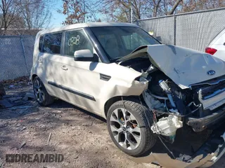 2012 Kia Soul + with VIN KNDJT2A62C7393781, listed as a IAAI auction lot 41818028 with 140,911 mi miles. Bid and sale history available at carsss.com. Image 1.