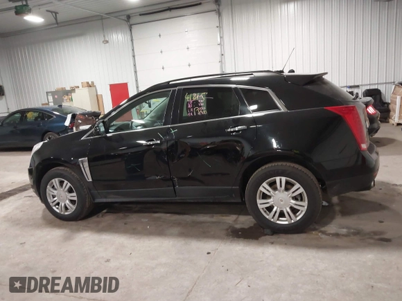 2015 Cadillac SRX with VIN 3GYFNAE36FS519604, listed as a IAAI auction lot 41215296 with 70,954 mi miles and . Bid and sale history available at DreamBid. Image 14.