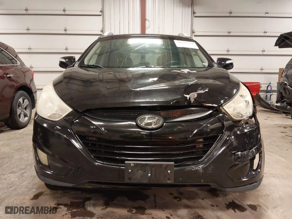 2013 Hyundai Tucson GLS with VIN KM8JU3AC0DU754948, listed as a IAAI auction lot 41811891 with 139,056 mi miles. Bid and sale history available at carsss.com. Image 6.