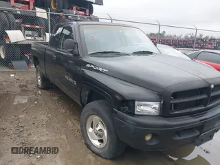 1999 Dodge 1500 z VIN 1B7HF13Z3XJ556390, wystawiony jako IAAI lot #41258681 z przebiegiem 274 653 mil mil oraz . Historia ofert i sprzedaży dostępna na DreamBid. Obrazek 1.