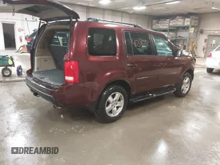 2011 Honda Pilot EX-L with VIN 5FNYF4H56BB051404, listed as a IAAI auction lot 41758332 with 301,099 mi miles. Bid and sale history available at carsss.com. Image 4.