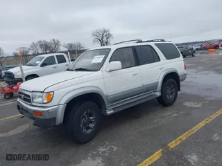 1998 Toyota 4Runner Limited with VIN JT3HN87RXW0148418, listed as a IAAI auction lot 41708975 with 305,530 mi miles. Bid and sale history available at carsss.com. Image 2.